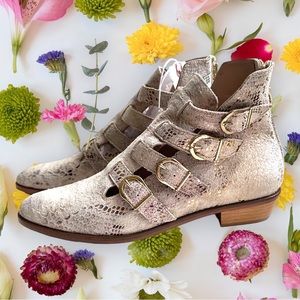 Gold snakeskin booties with buckle detail. Dresses up or down! Size 37 NWT